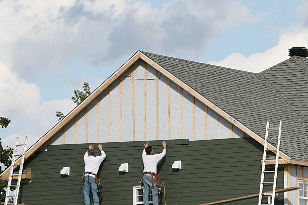 Professional Siding Contractor technician working in Ashley, OH